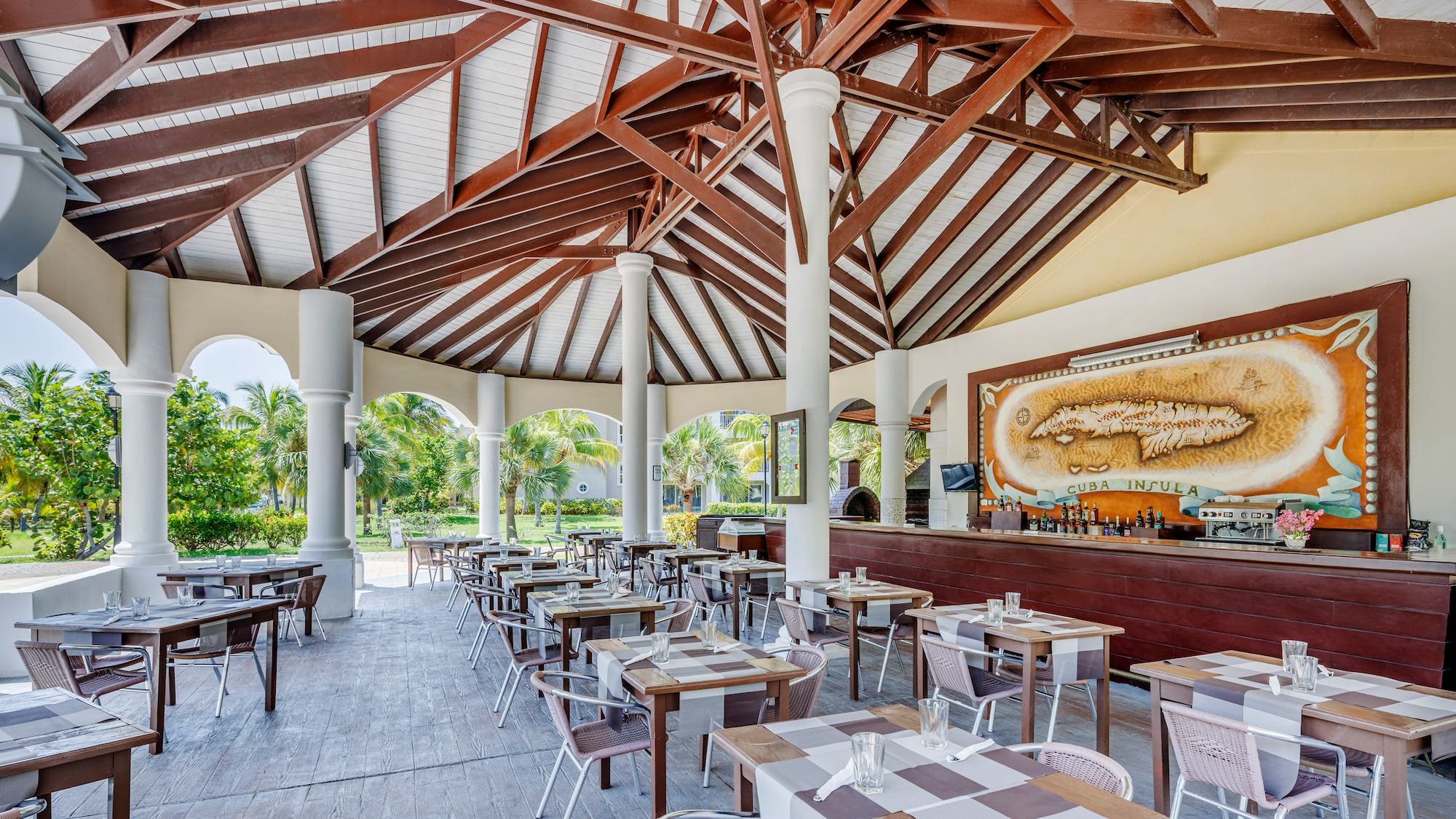 a restaurant with tables and chairs
