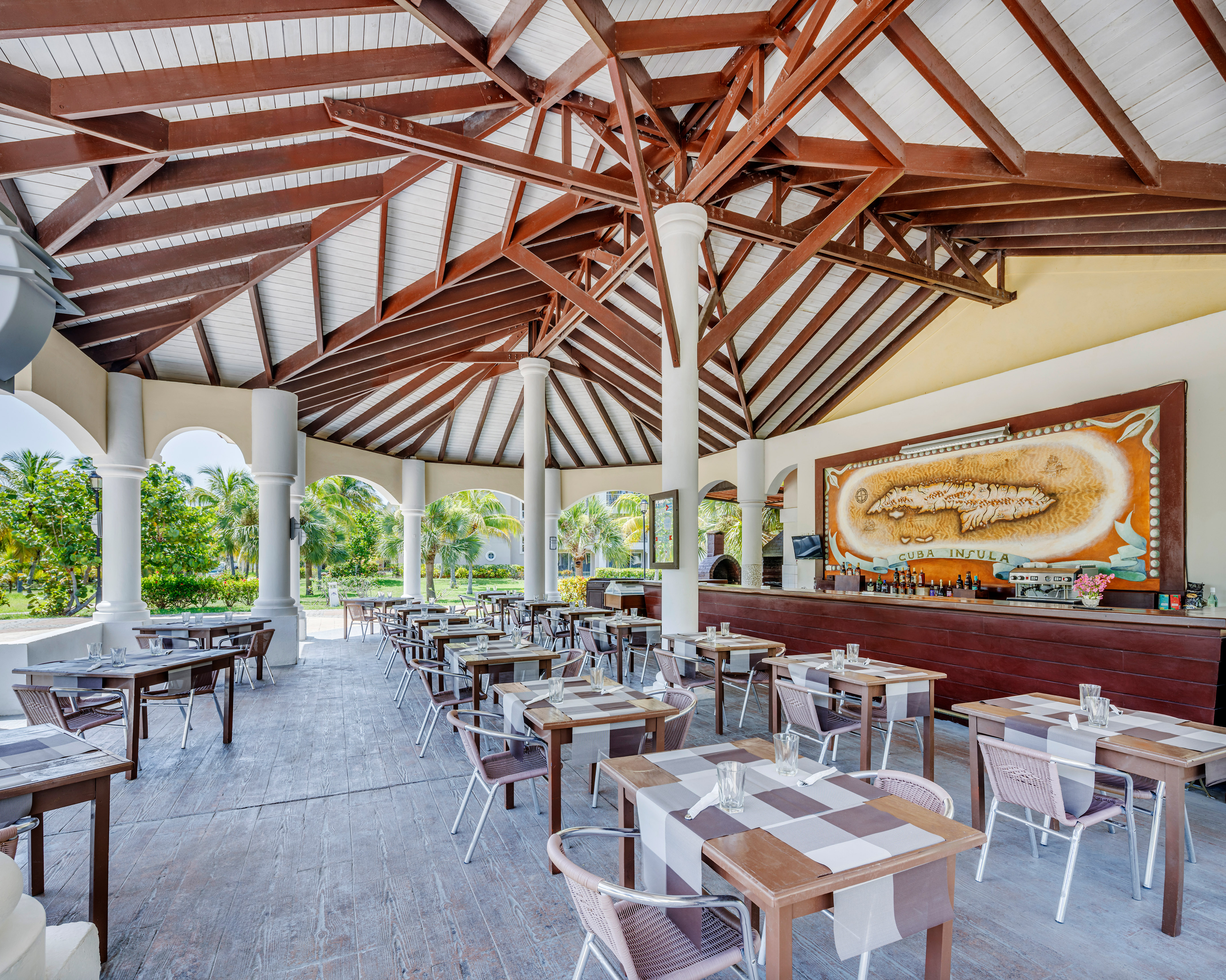 a restaurant with tables and chairs