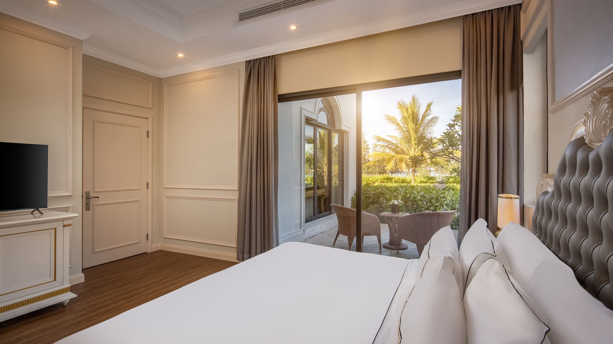 a bedroom with a large window