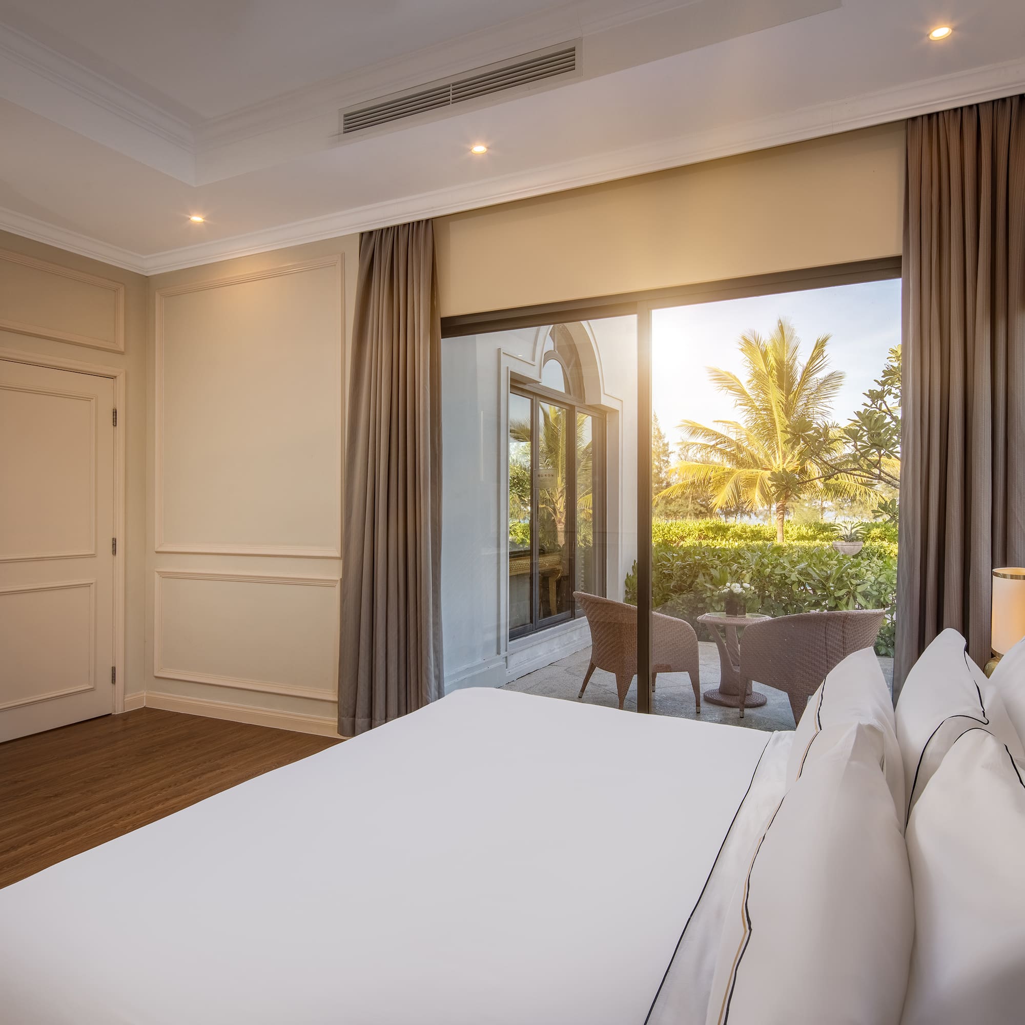 a bedroom with a large window