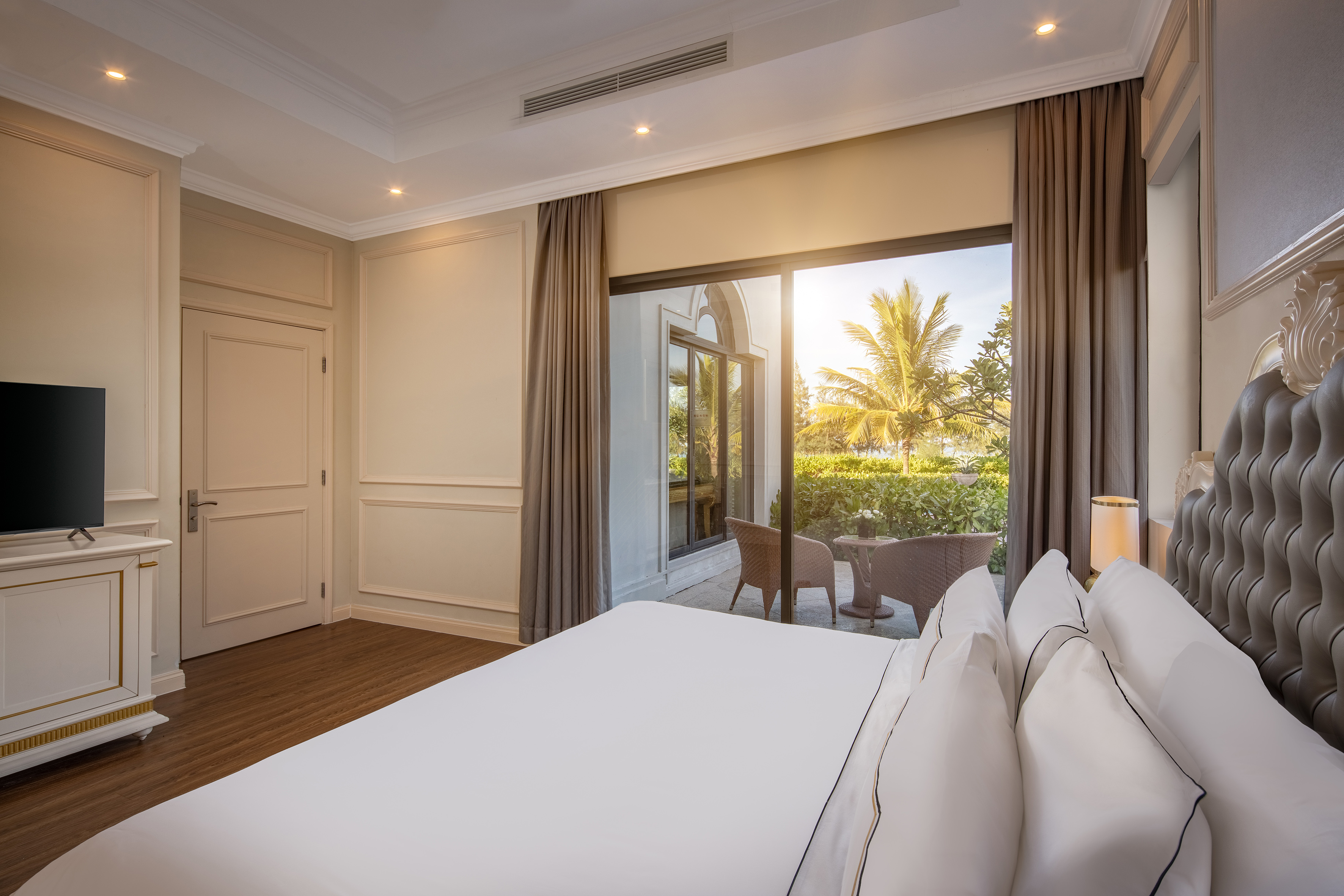 a bedroom with a large window