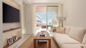 a living room with a couch and a coffee table