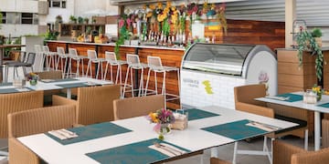 a table and chairs outside a restaurant