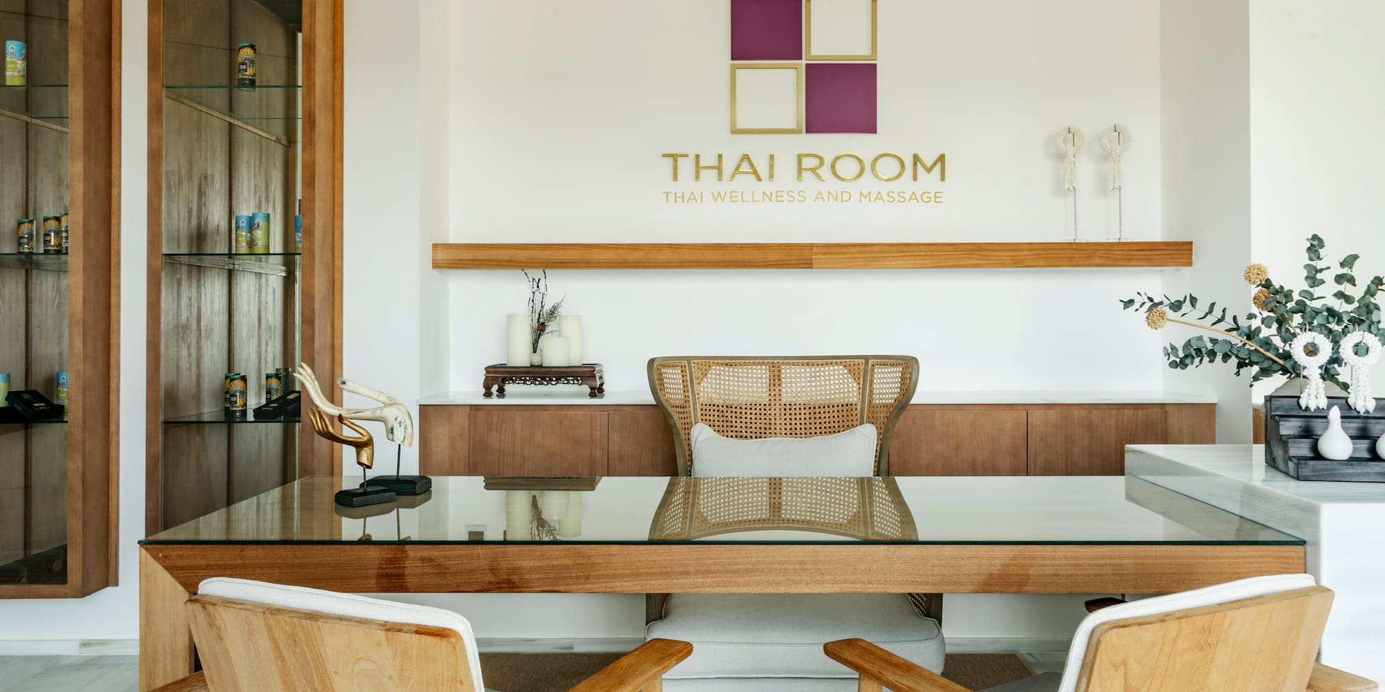 a room with a table and chairs