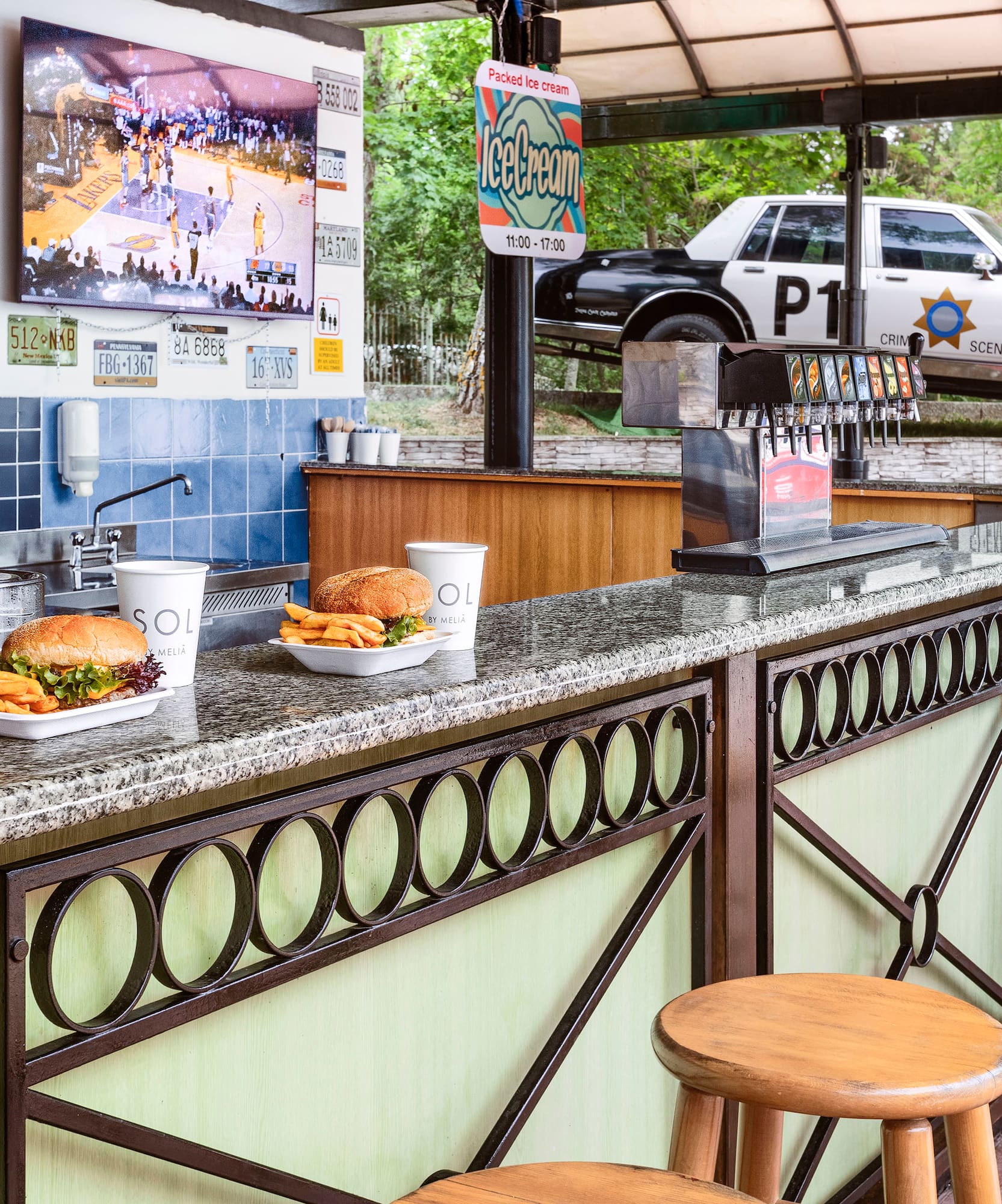 a counter with food and drinks on it