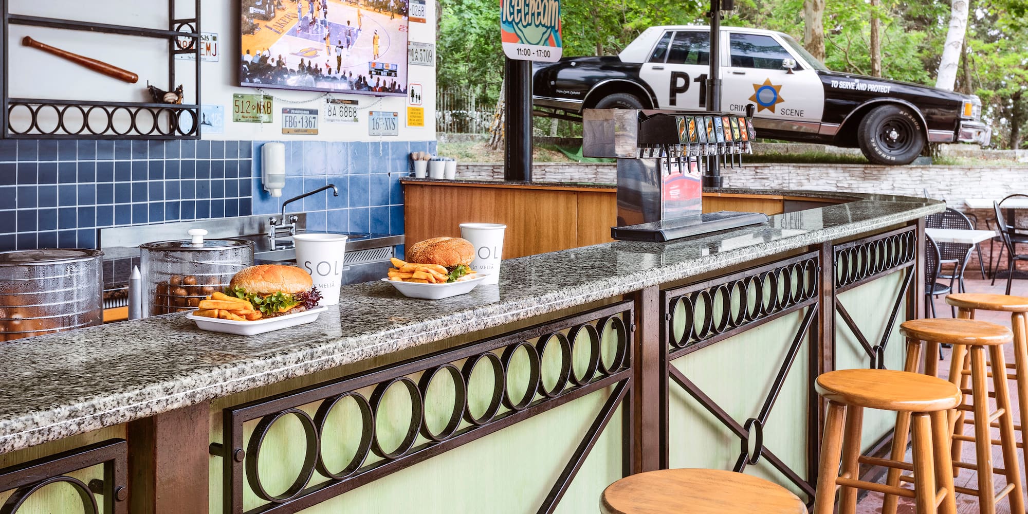 a counter with food and drinks on it