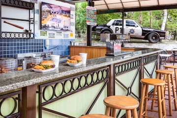 a counter with food and drinks on it