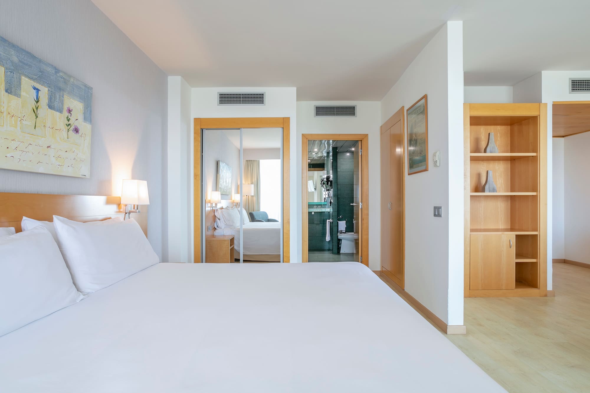 a bedroom with a bed and a closet