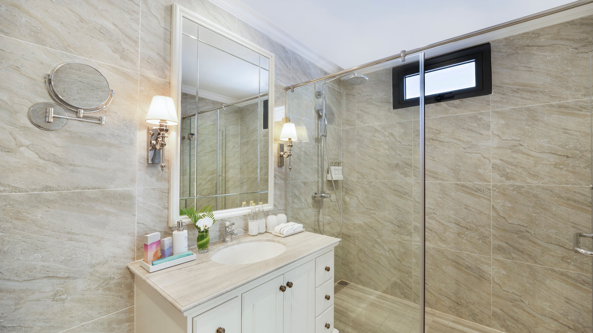 a bathroom with a shower and sink