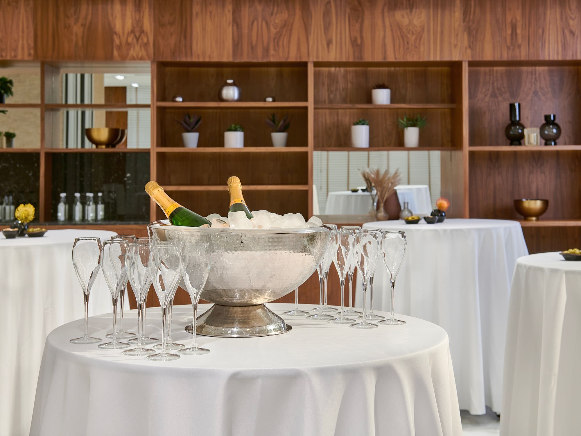 a group of champagne glasses on a table