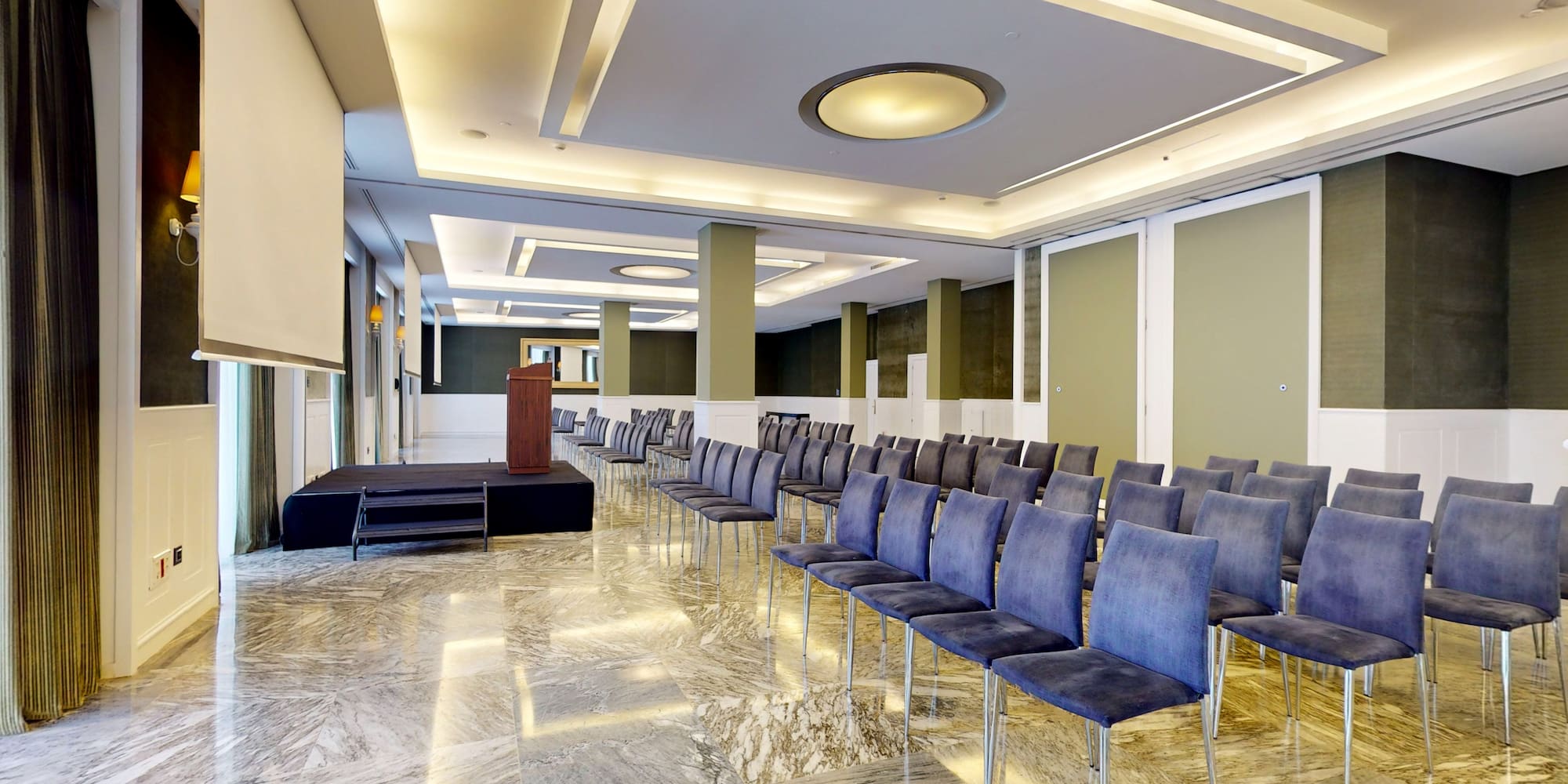 a room with rows of chairs