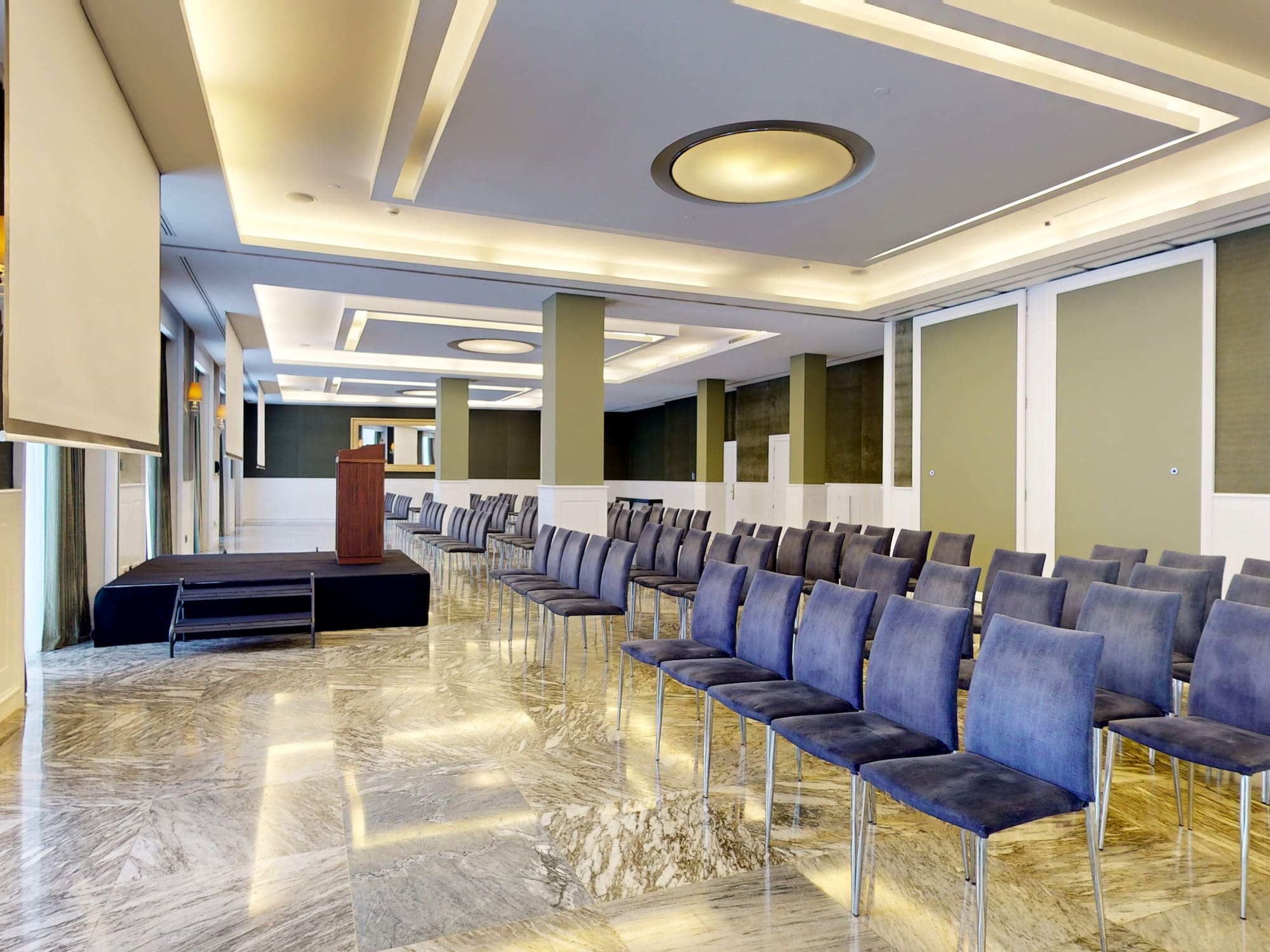 a room with rows of chairs