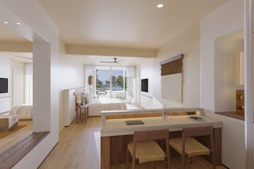 a room with a table and chairs