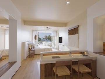 a room with a table and chairs