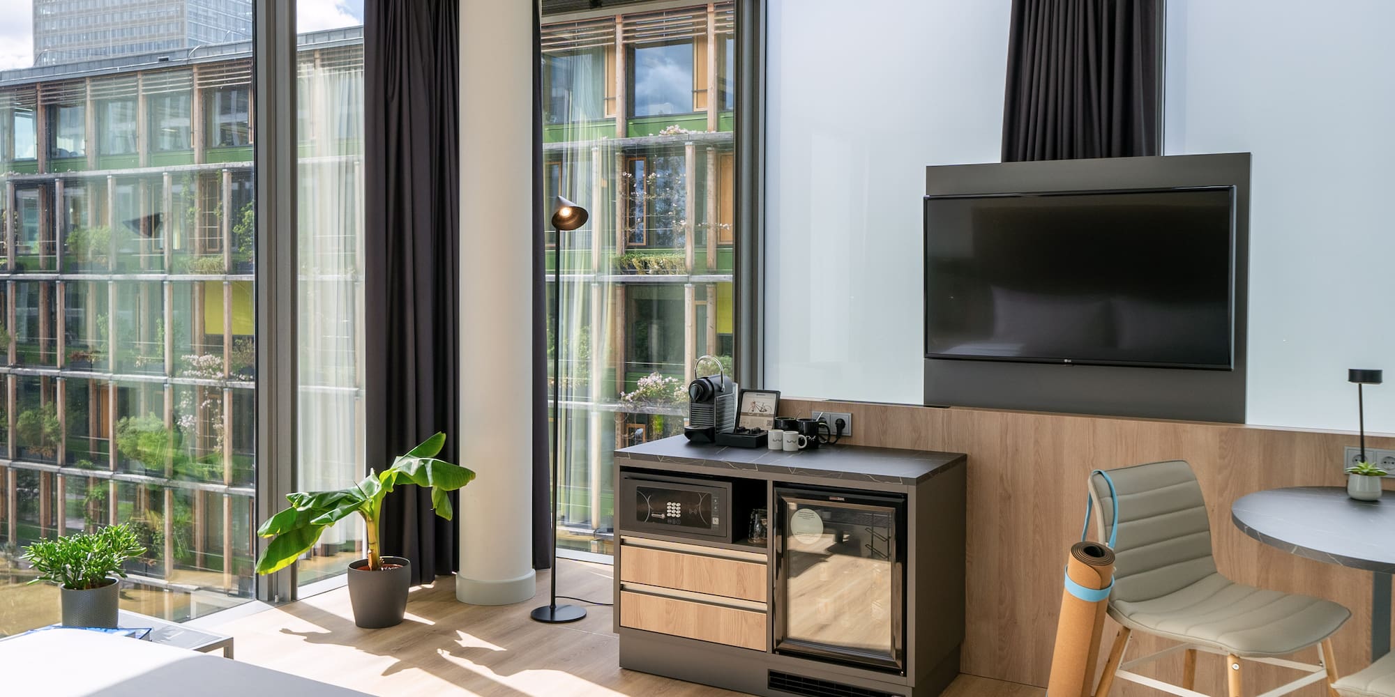 a room with a television and a chair