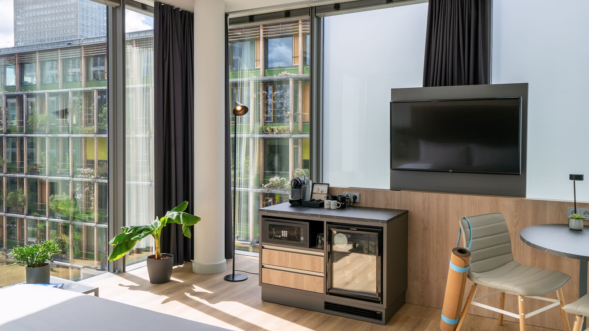 a room with a television and a chair