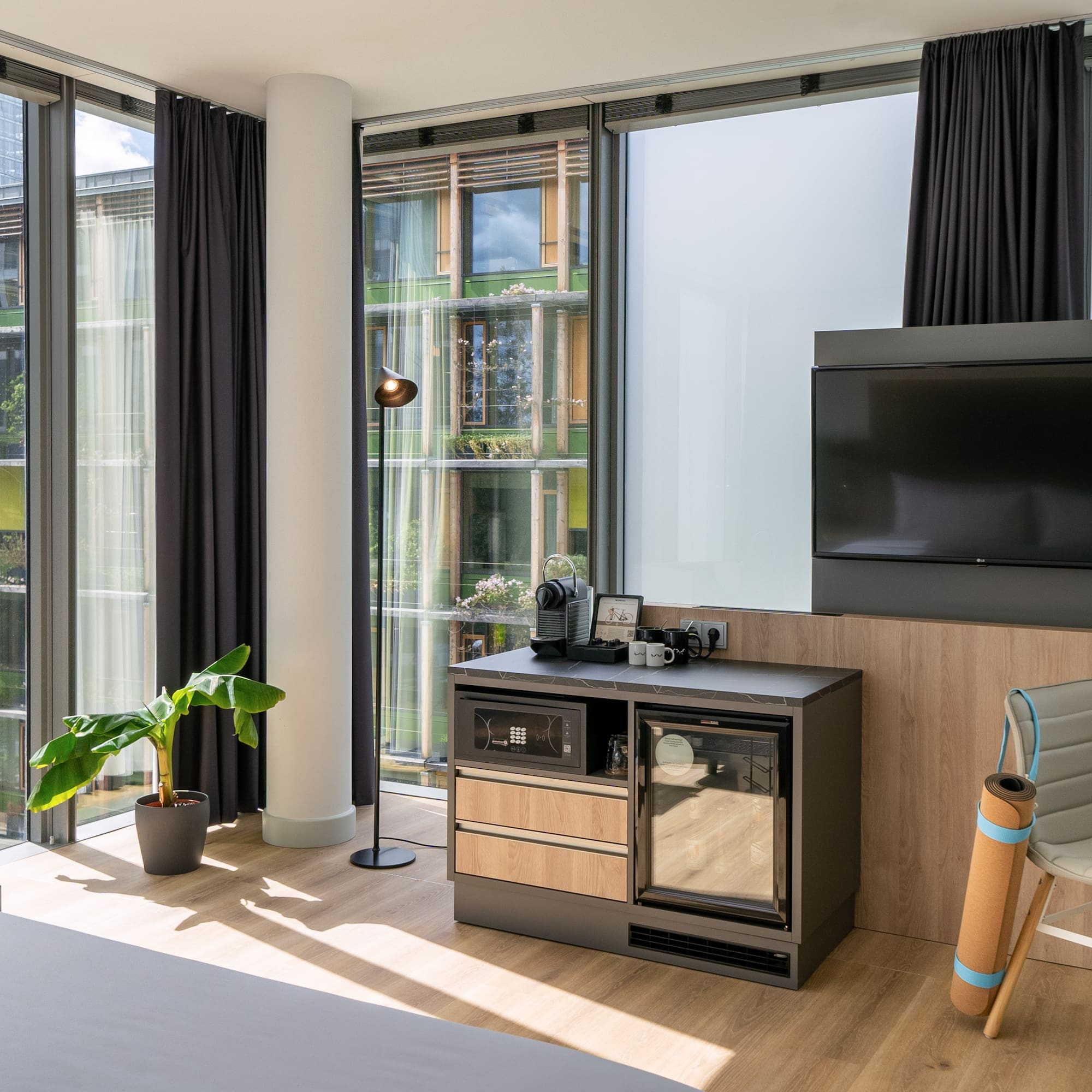 a room with a television and a chair