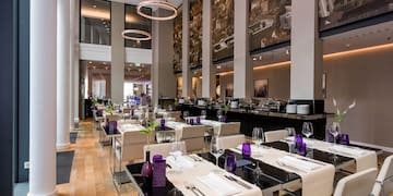 a restaurant with tables and chairs