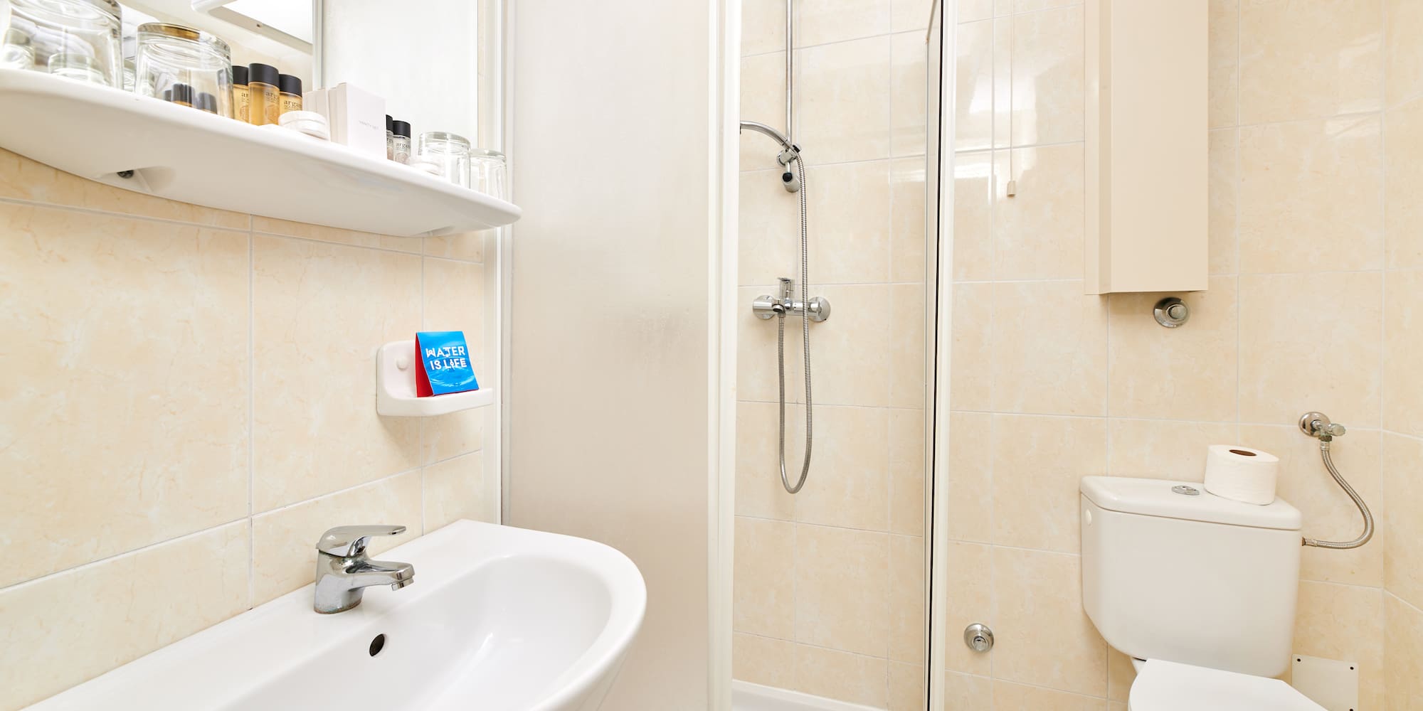 a bathroom with a shower and toilet