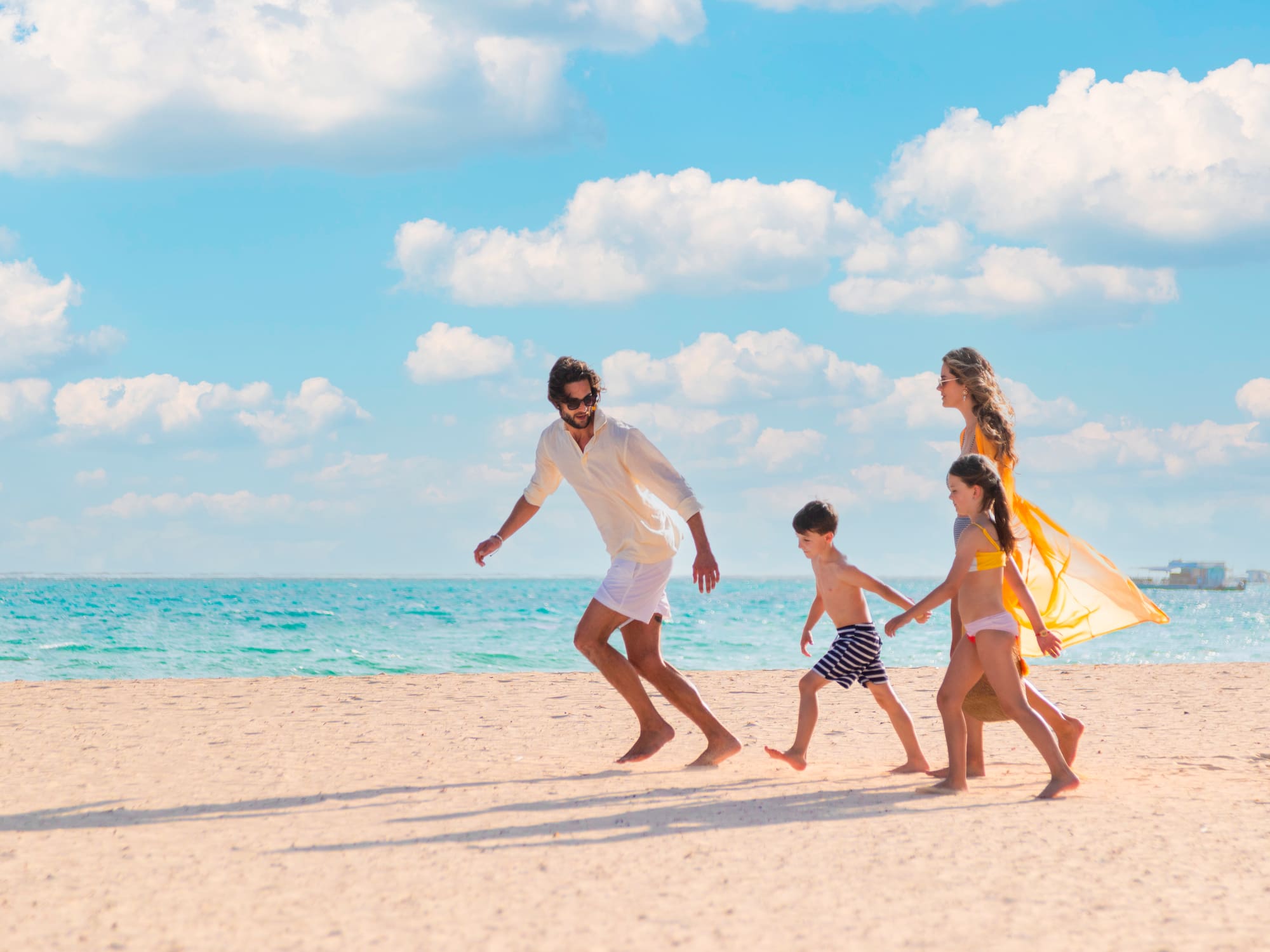 a group of people on a beach