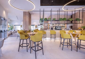 a room with tables and chairs
