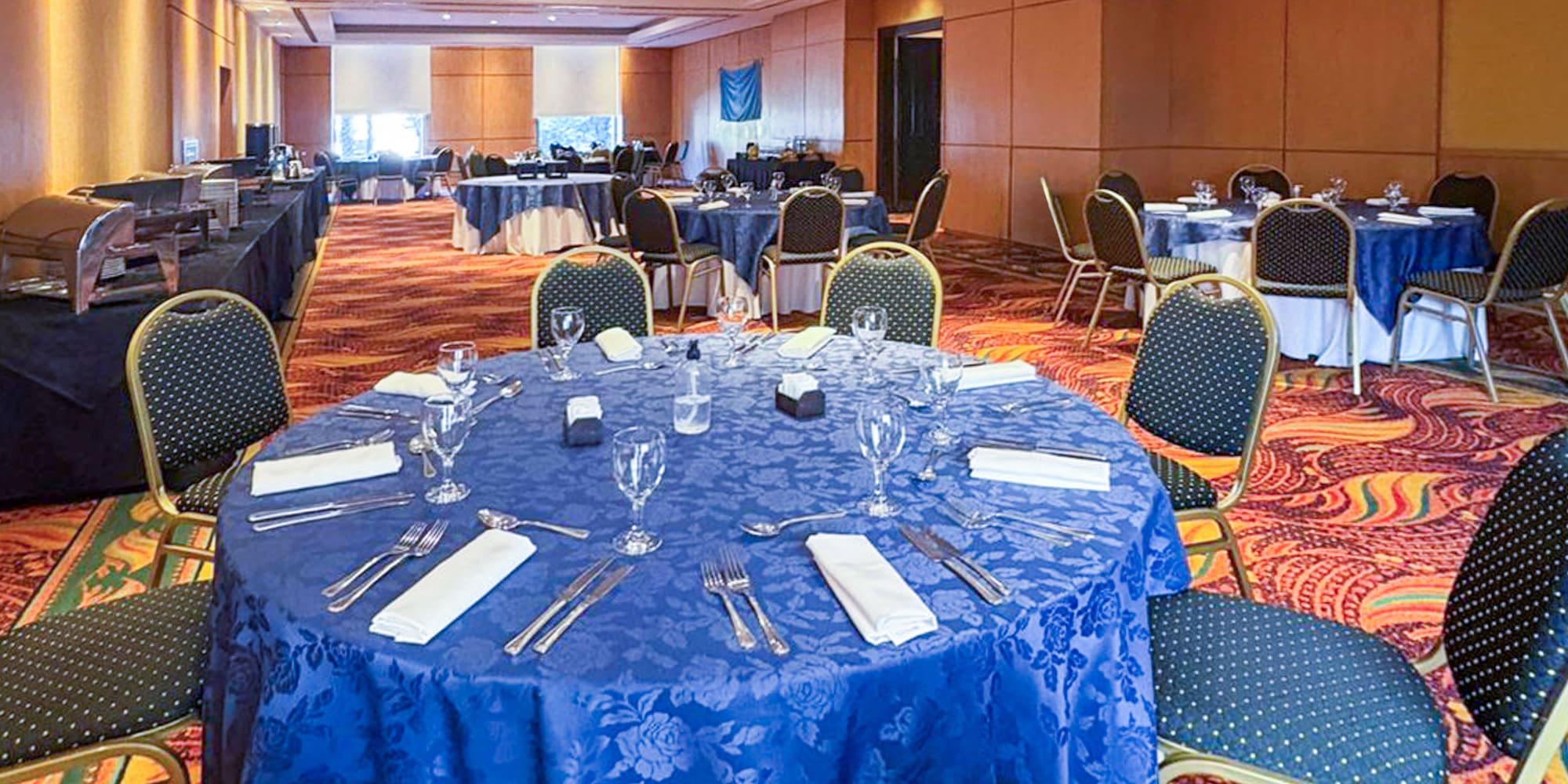 a room with tables and chairs