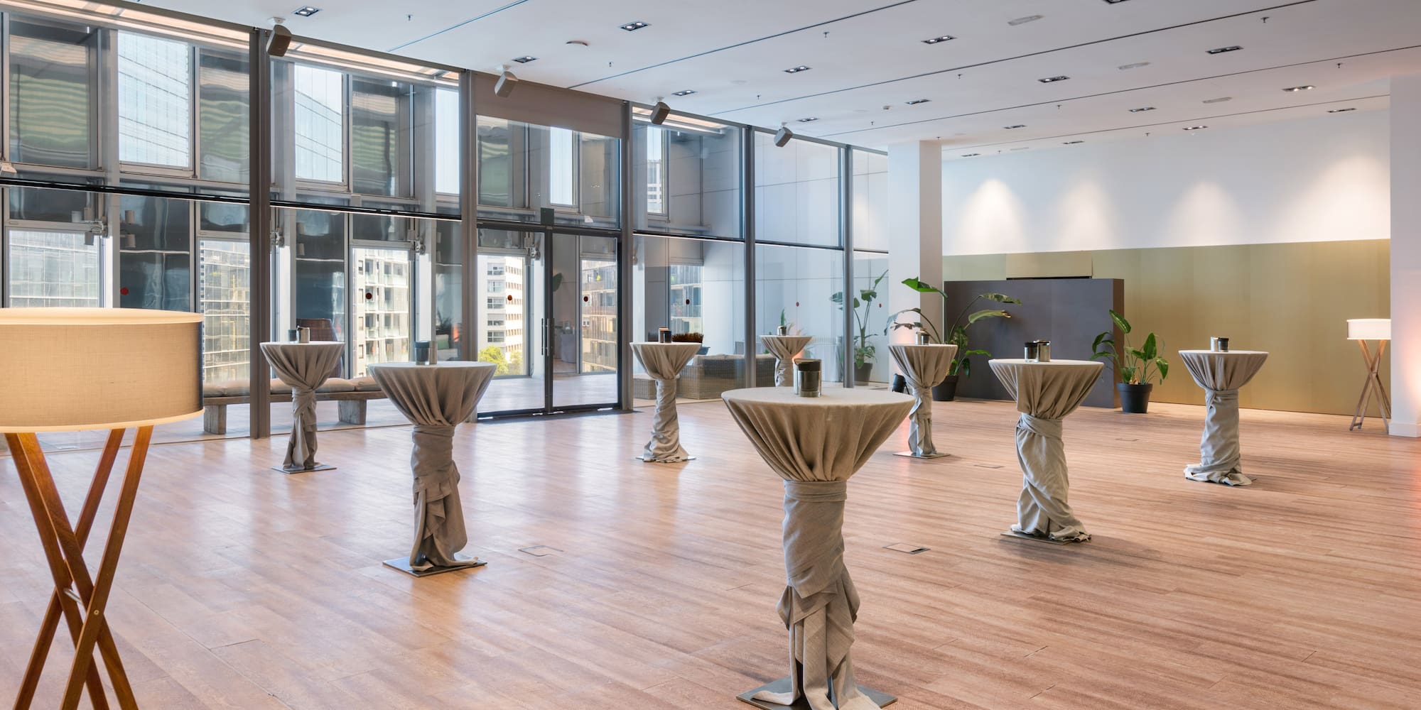 a room with tables covered with cloth