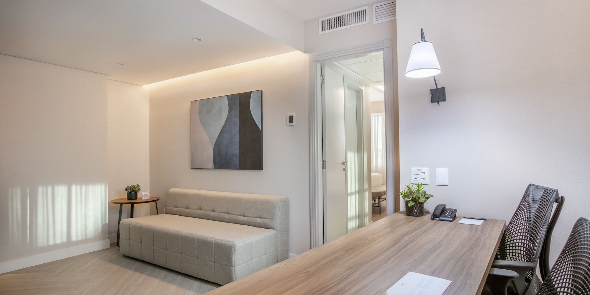 a room with a table and couch