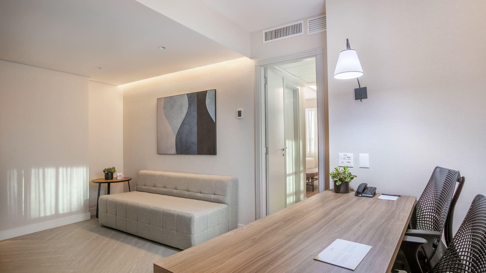 a room with a table and couch