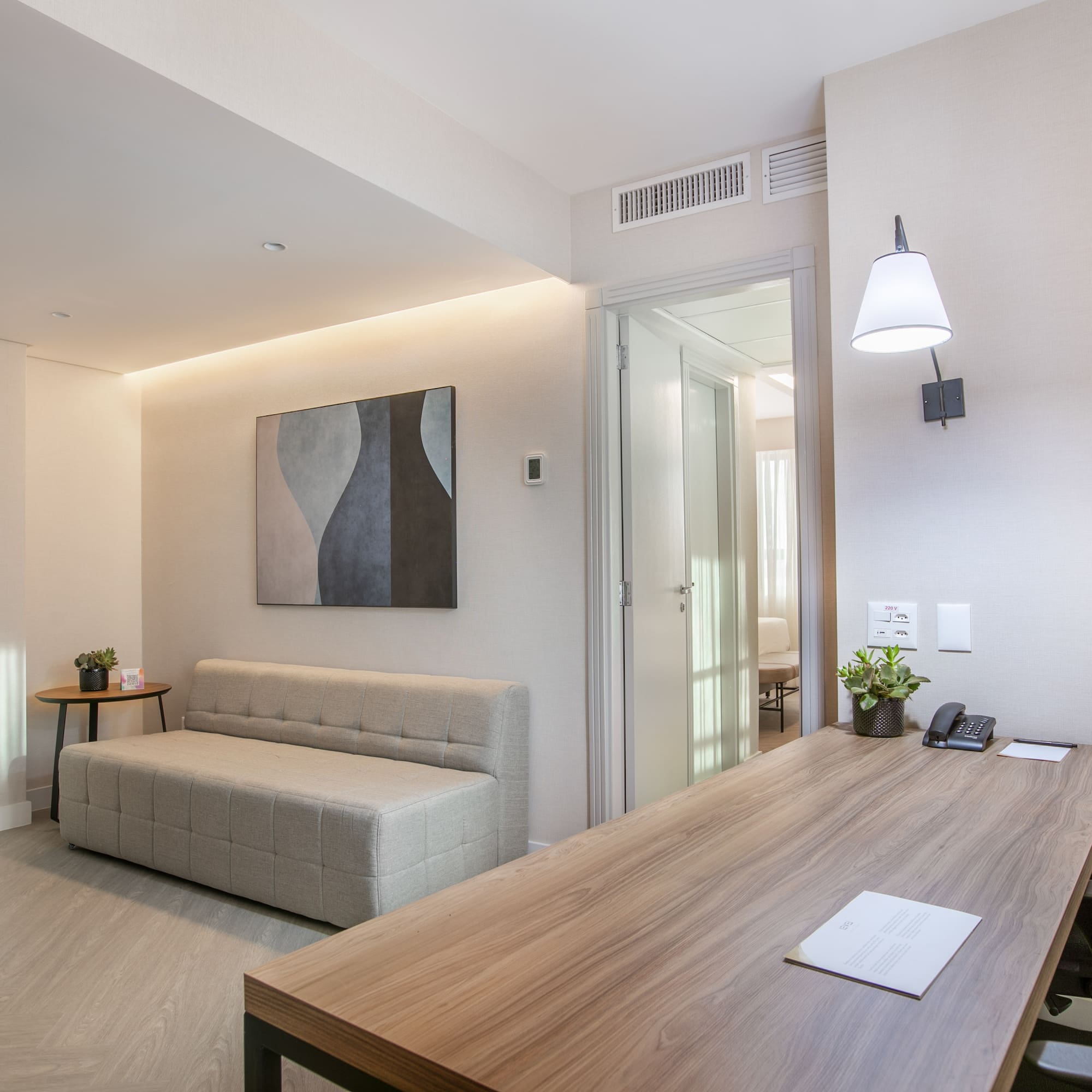 a room with a table and couch