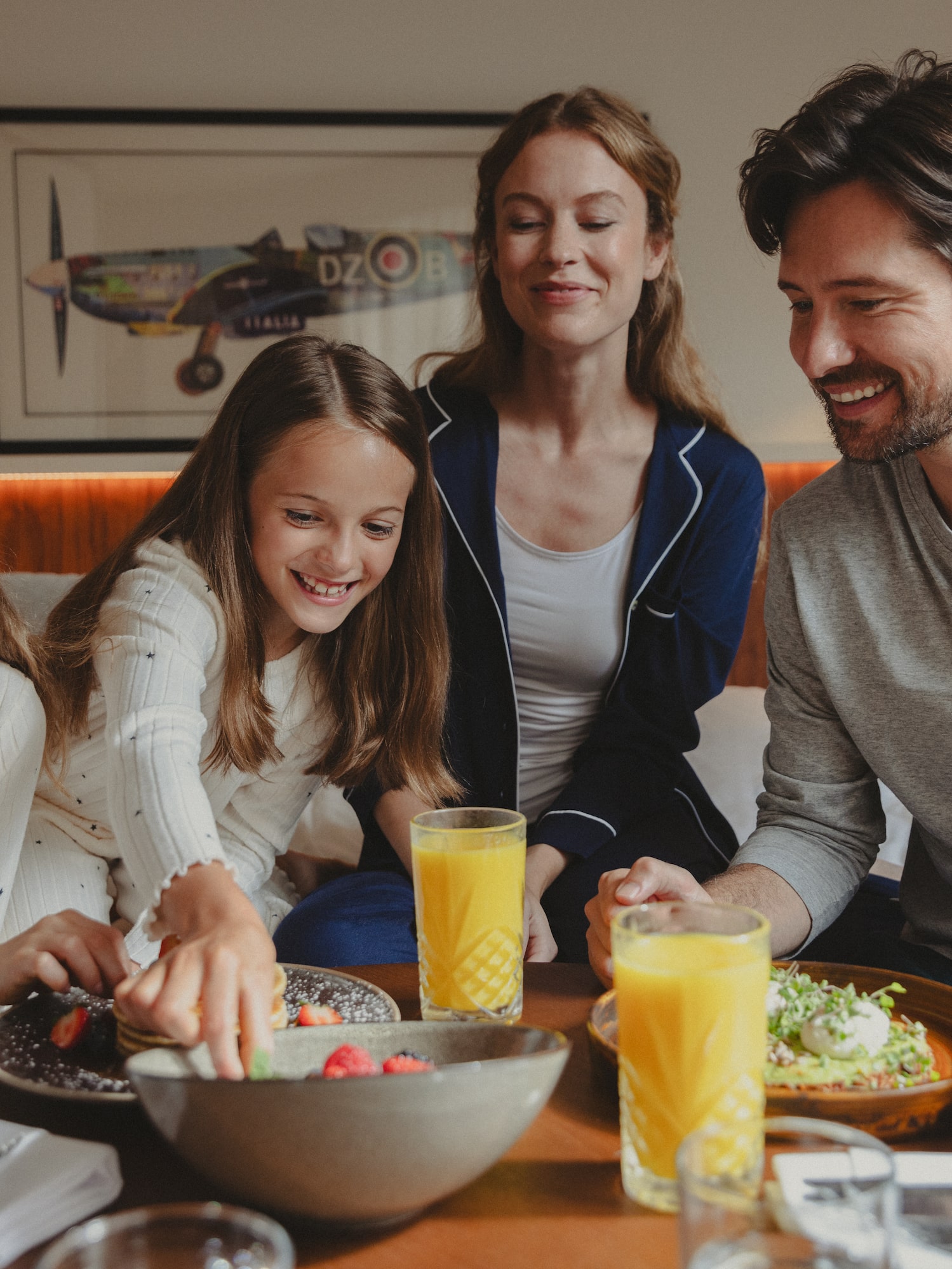 a group of people sitting around a table