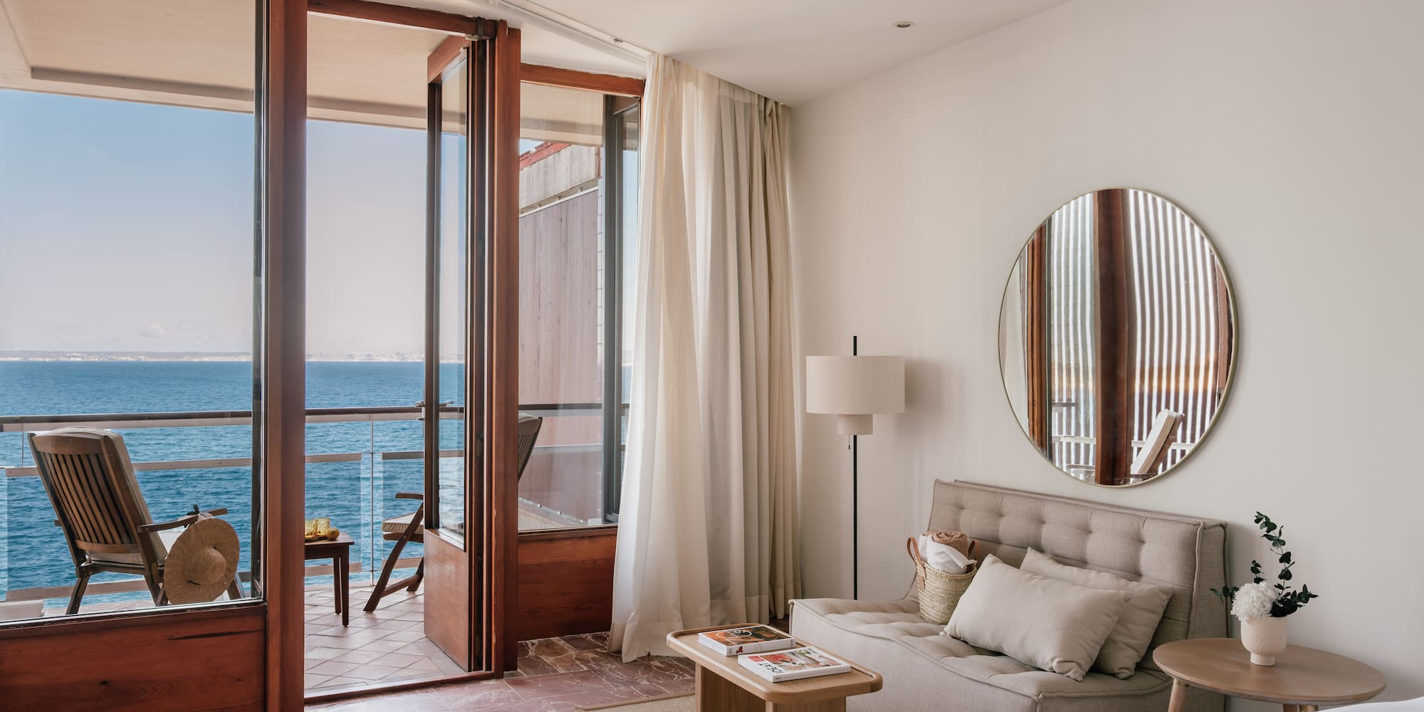 a room with a bed and a mirror