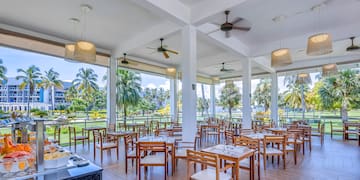 a room with tables and chairs