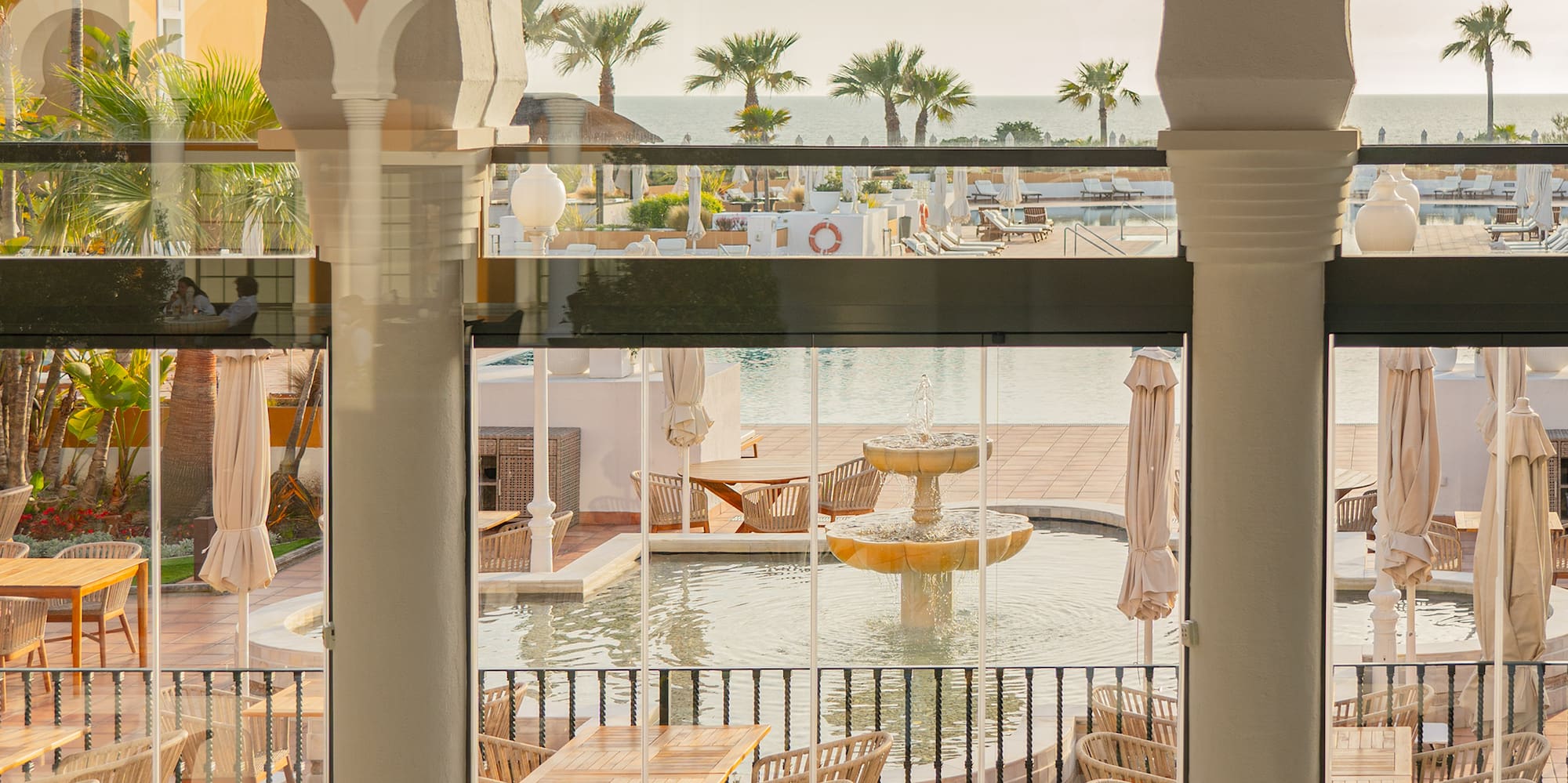 a view of a pool from a restaurant