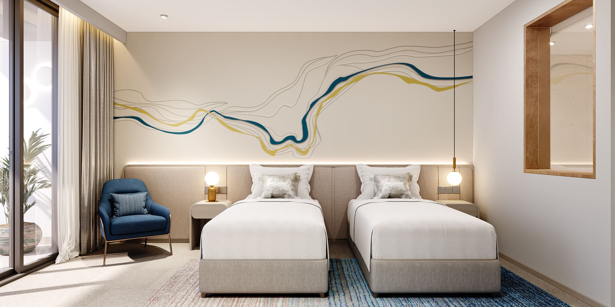 a room with two beds and a blue chair