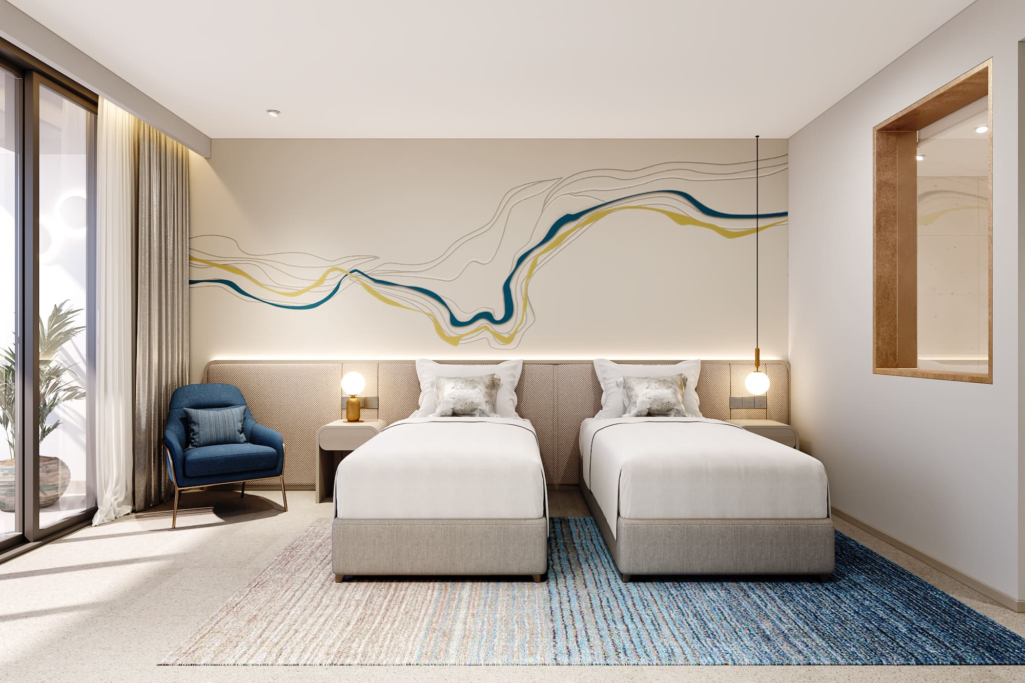 a room with two beds and a blue chair