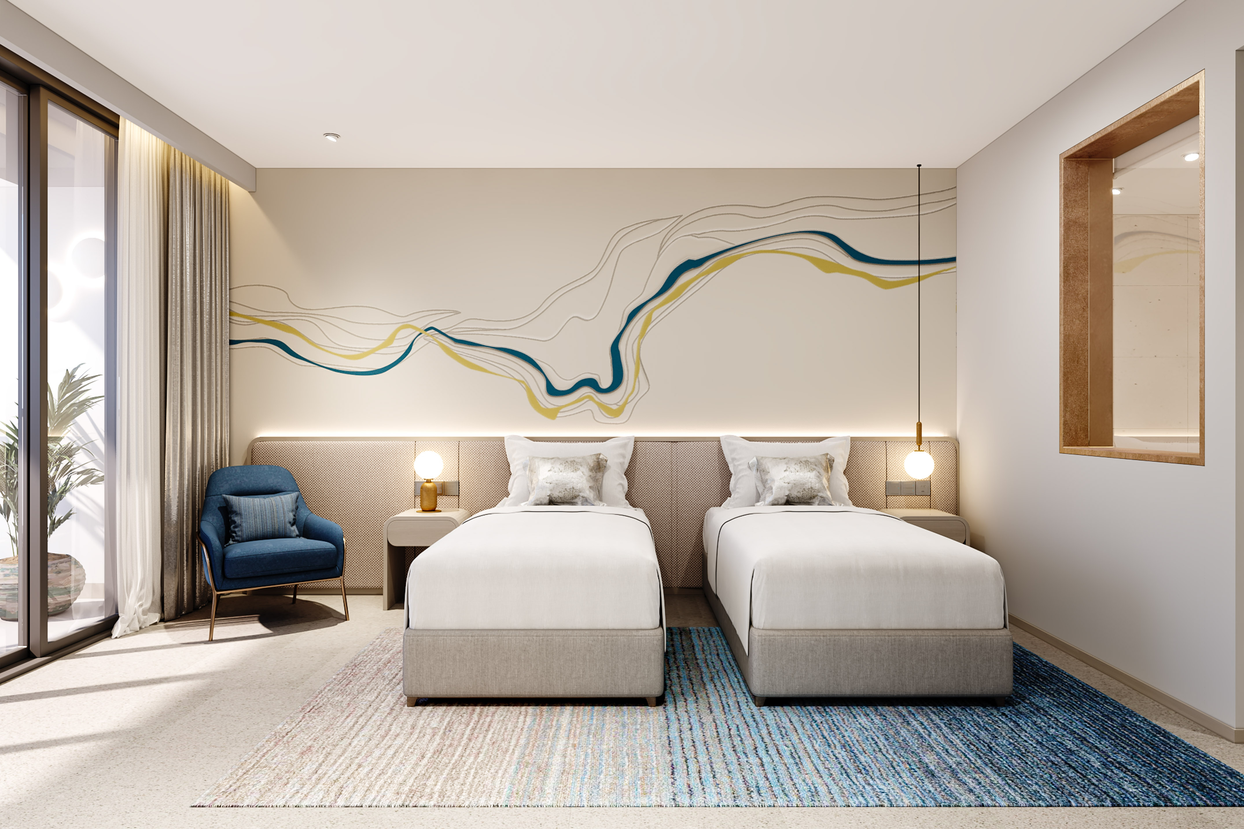 a room with two beds and a blue chair