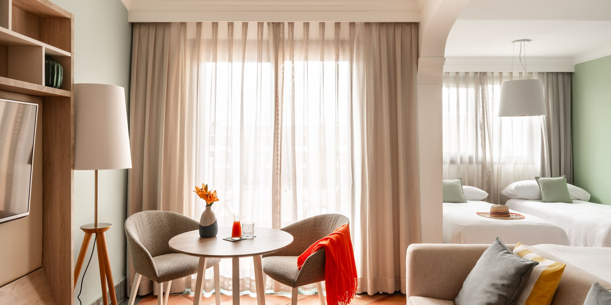 a room with a table and chairs