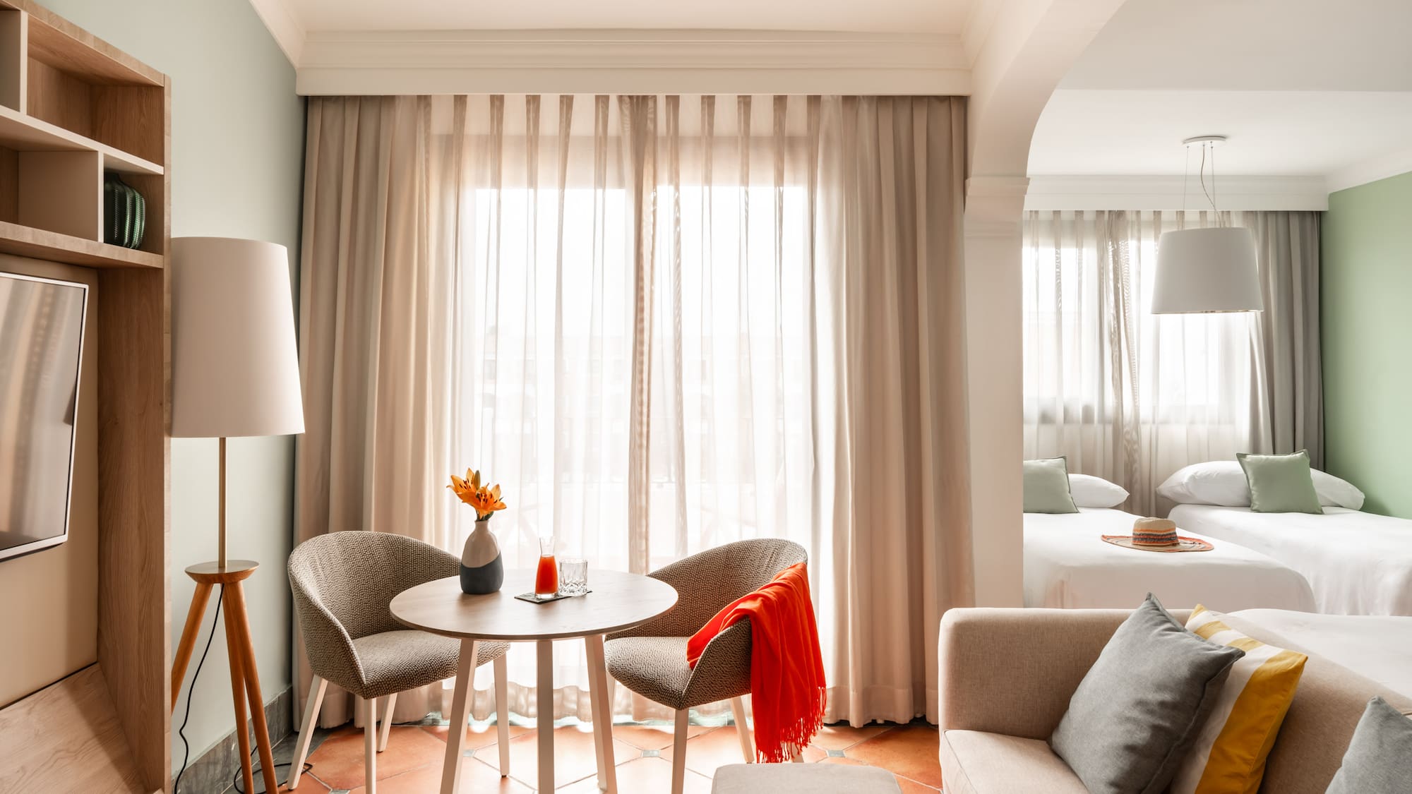 a room with a table and chairs