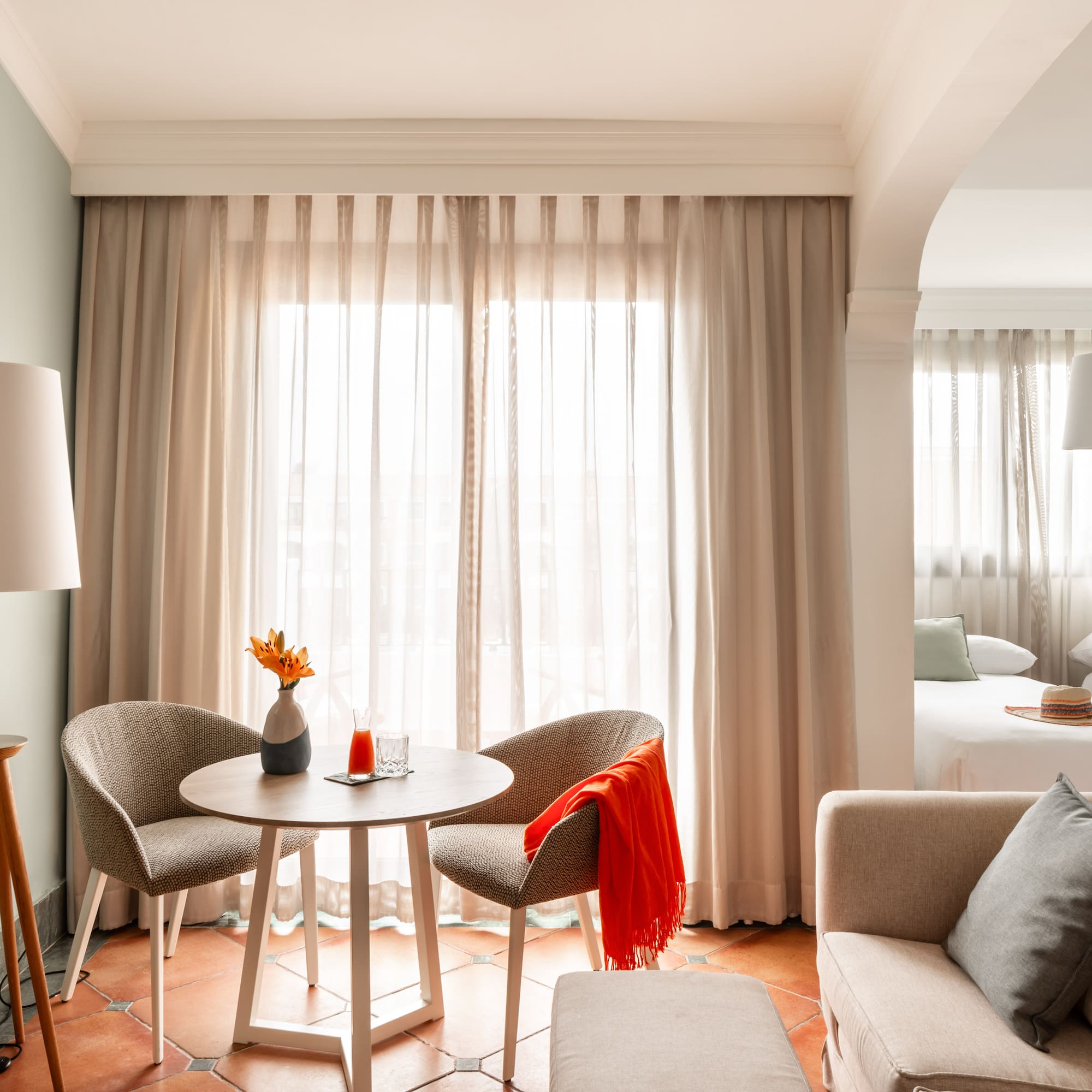 a room with a table and chairs