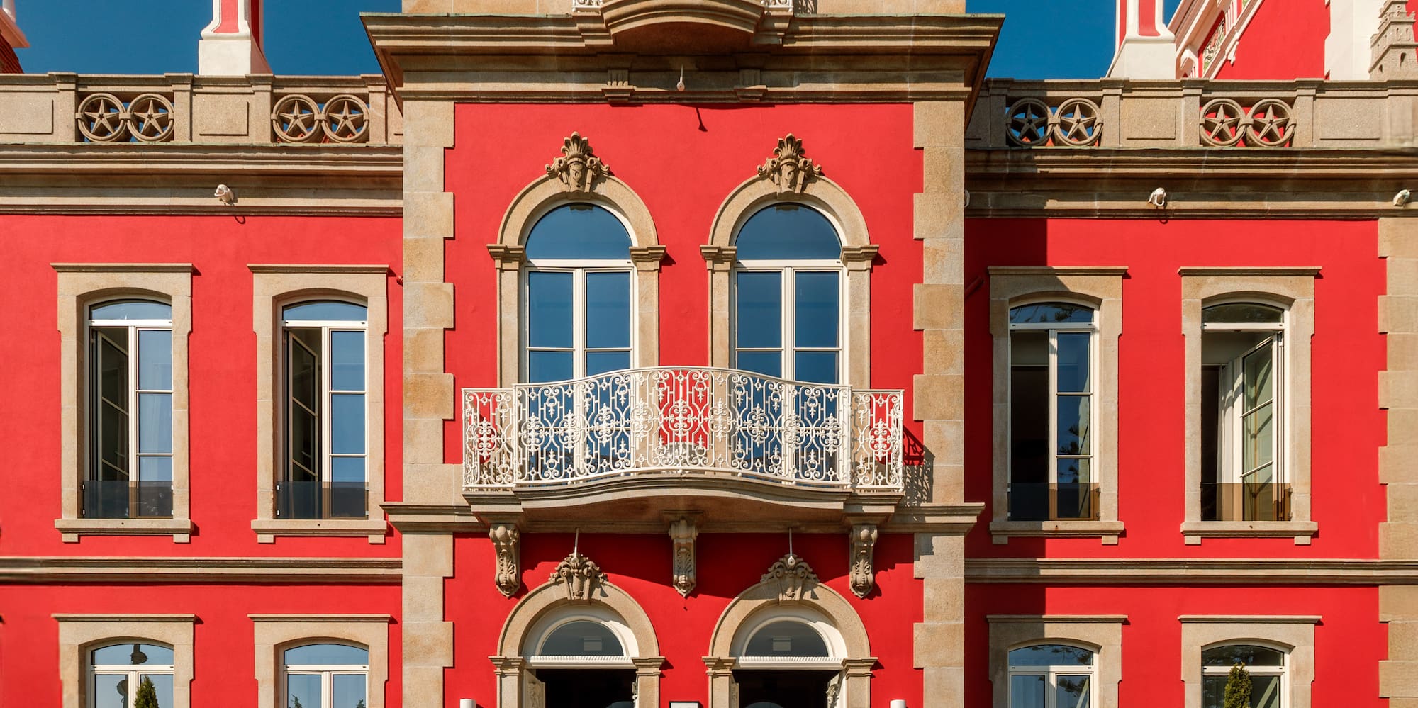 a red building with a white sign