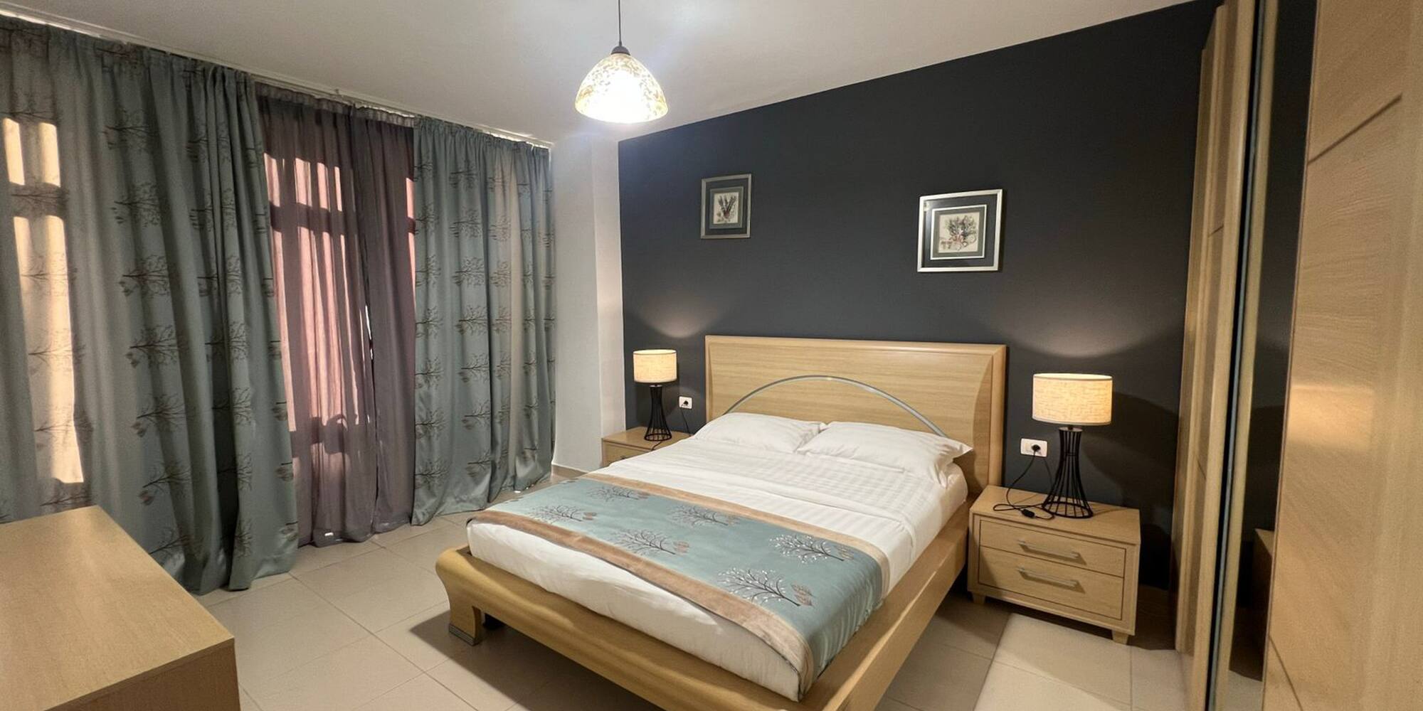 a bedroom with a bed and a closet