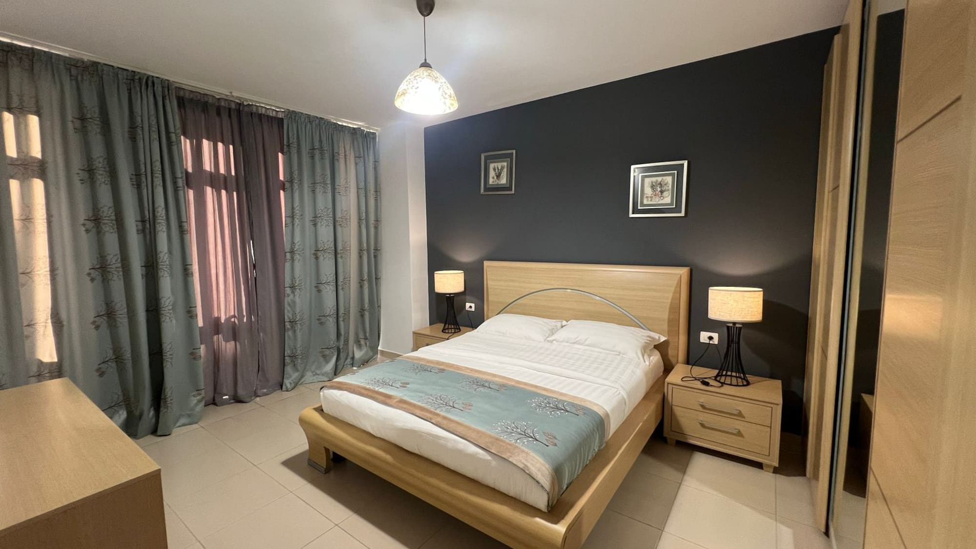 a bedroom with a bed and a closet