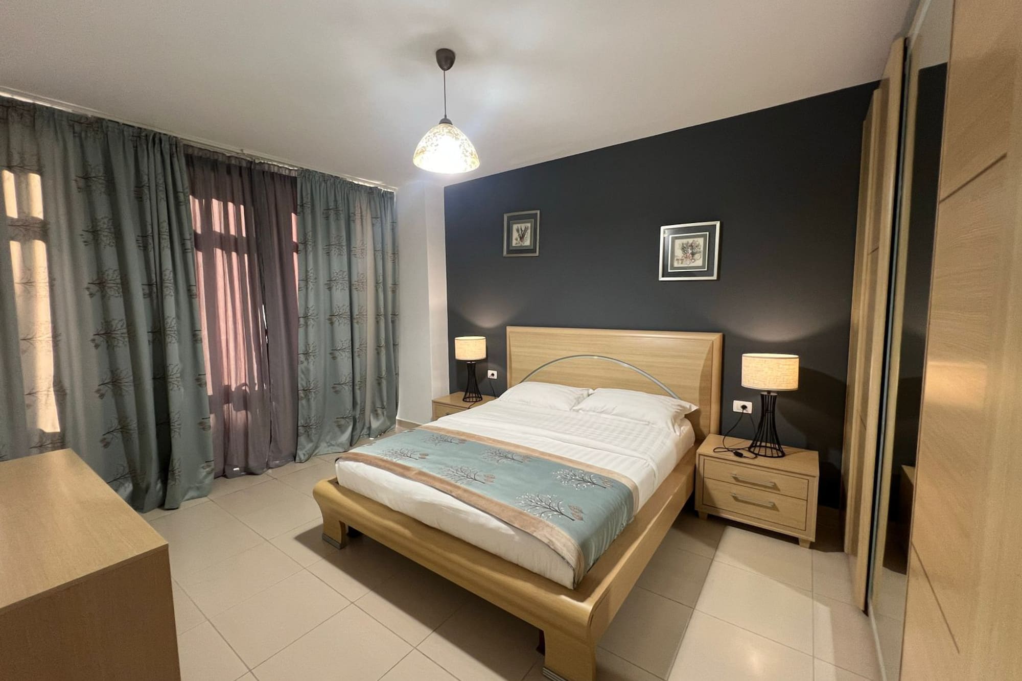 a bedroom with a bed and a closet