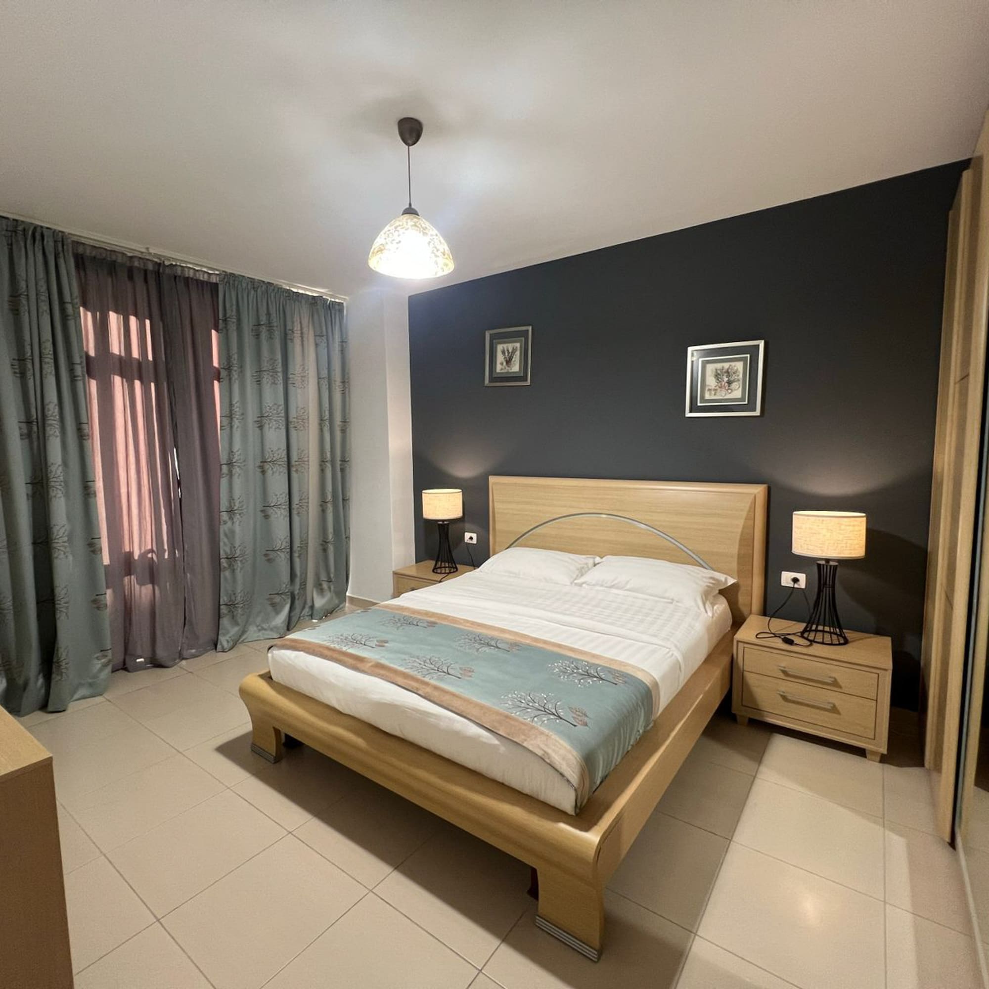 a bedroom with a bed and a closet