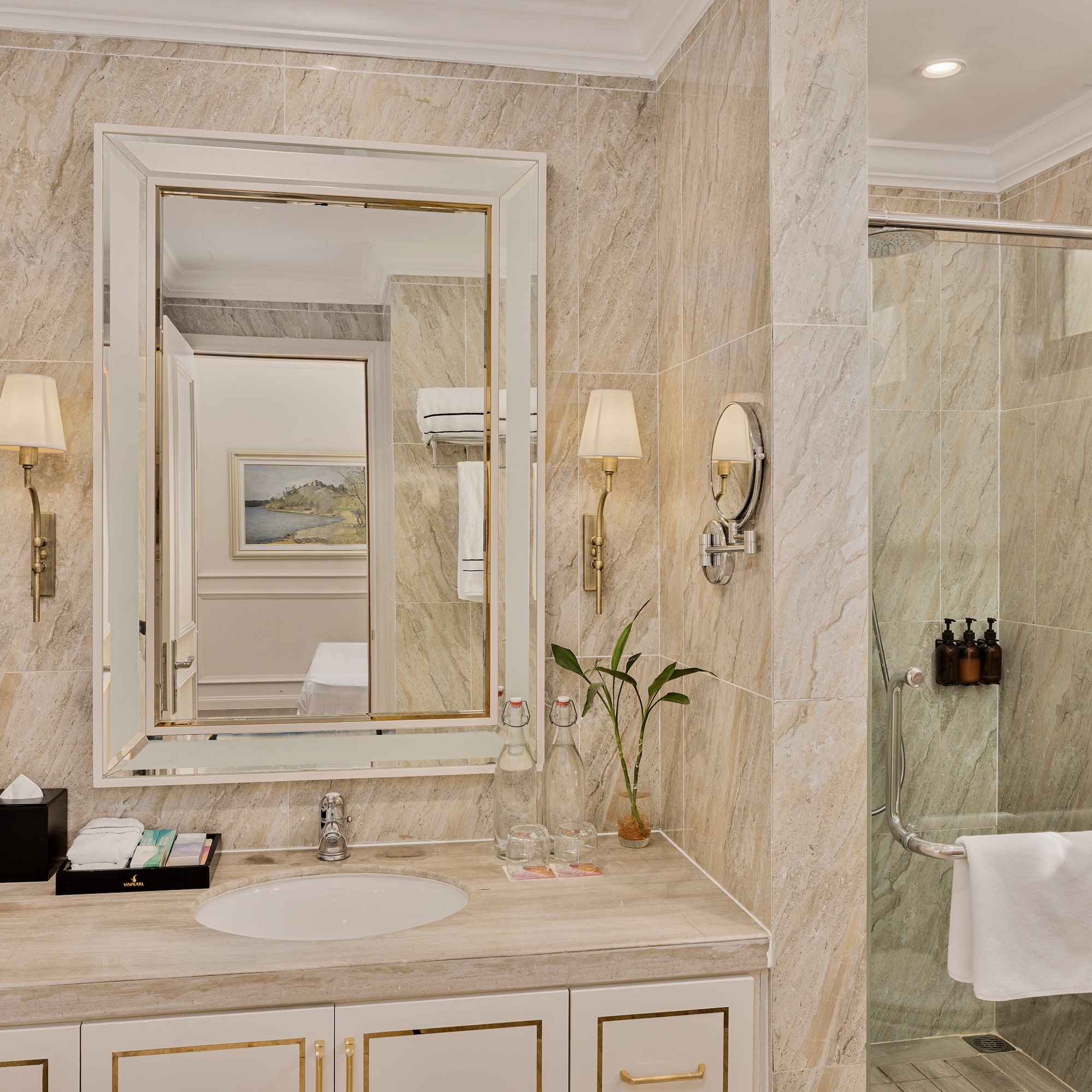 a bathroom with a mirror and a shower