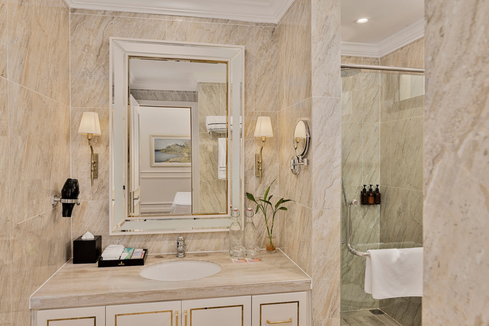 a bathroom with a mirror and a shower