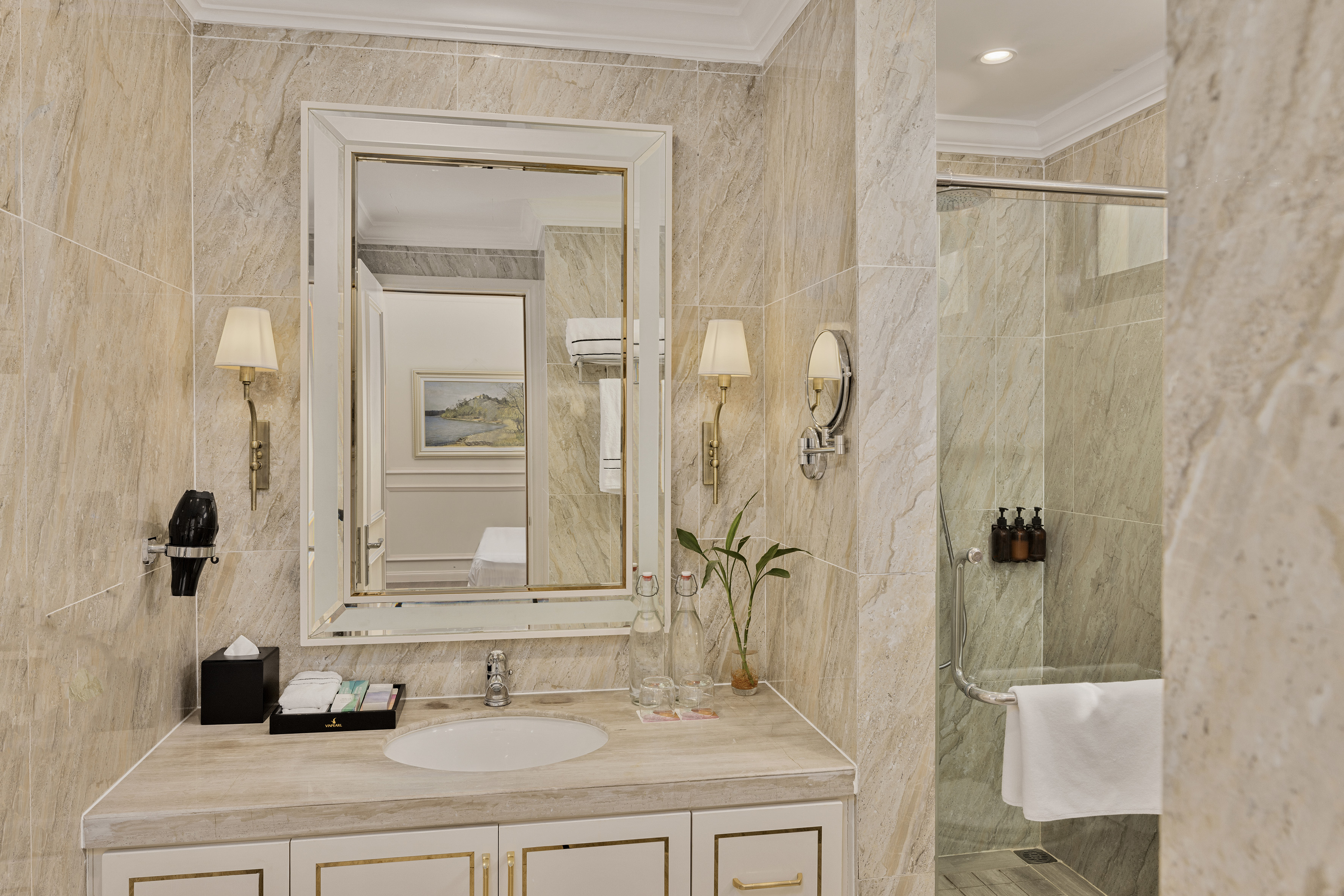 a bathroom with a mirror and a shower