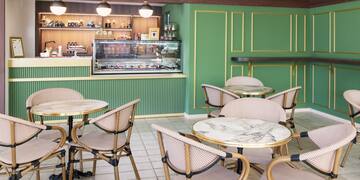 a room with tables and chairs