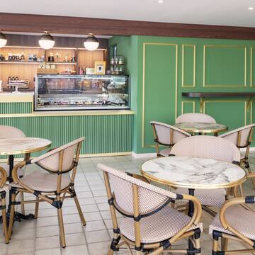 a room with tables and chairs